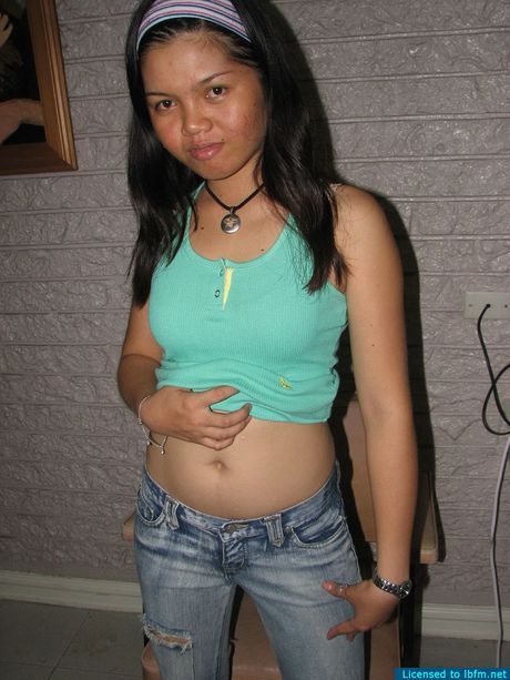 Young country girl shyly posing naked for the very first time