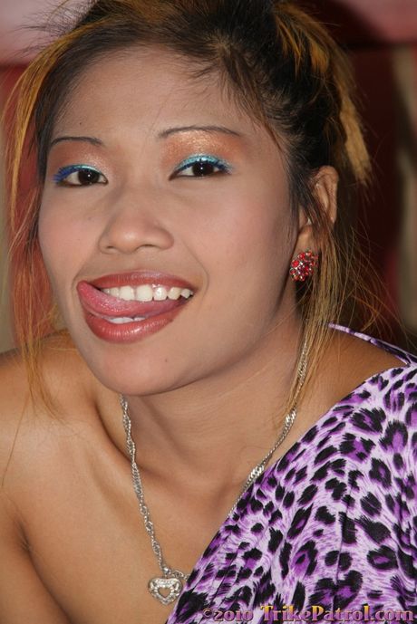 Asian teen Abbey strips and shows her tiny tits and ass in a solo