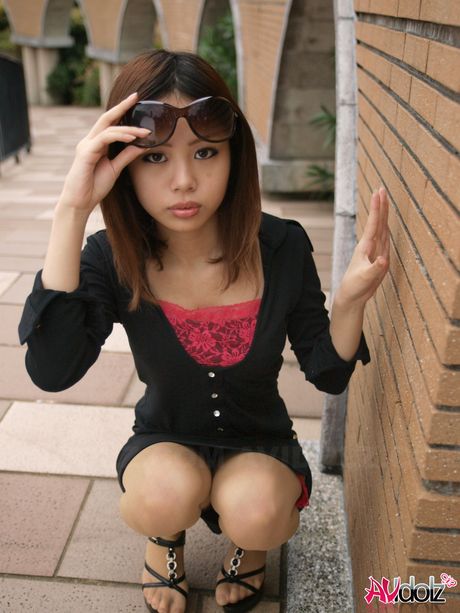 Fantastic Asian teen Rena strips and shows her tiny tits and pussy in a solo