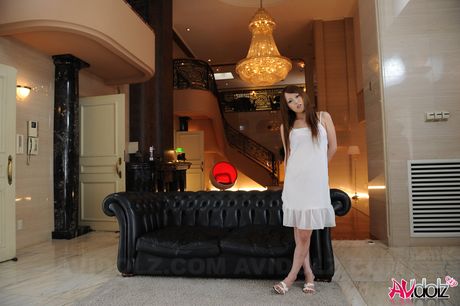 Hot Asian teen Ichika strips and shows her tiny tits and pink pussy