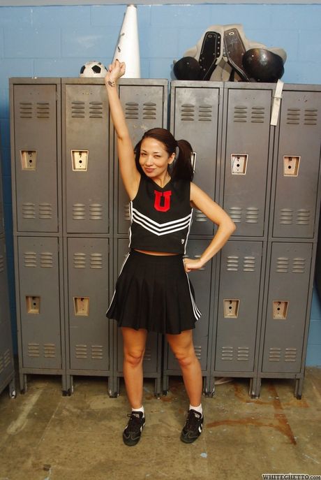 Attractive oriental milf Coco Velvet shows her ass