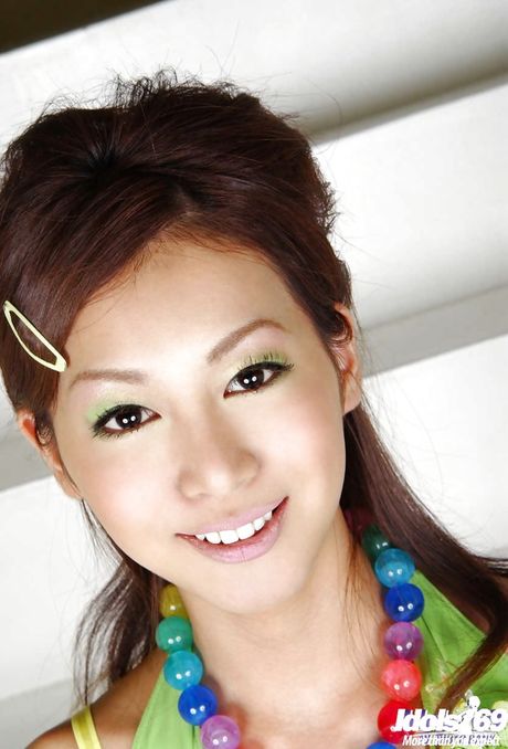 Gracile japanese young Honoka in sexy panties revealing tiny tits and spreading her legs